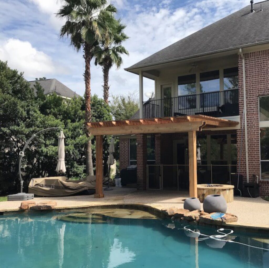 Pergola attached to house in Fulshear TX