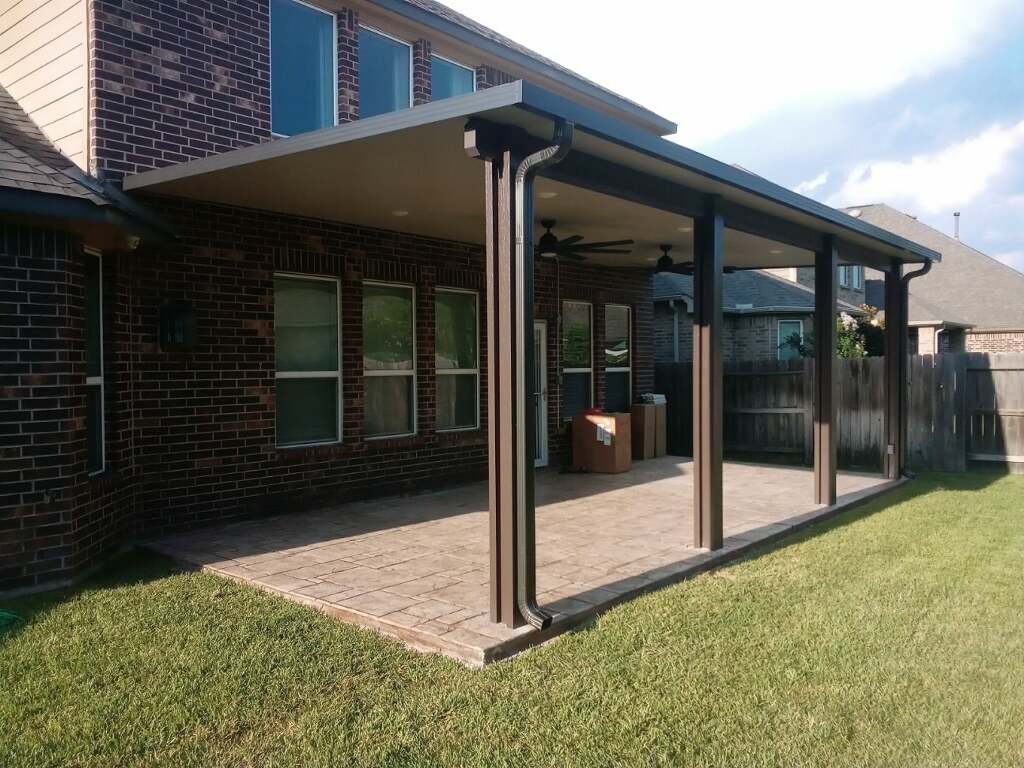 Aluminum patio near me with stamped concrete